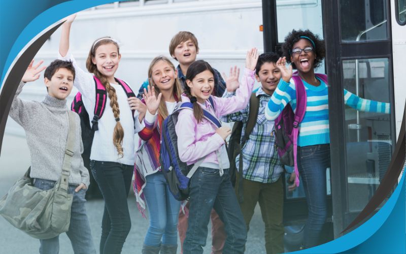 students posing in front of a coach with their teacher, affordable coach hire, June 2024, Australia